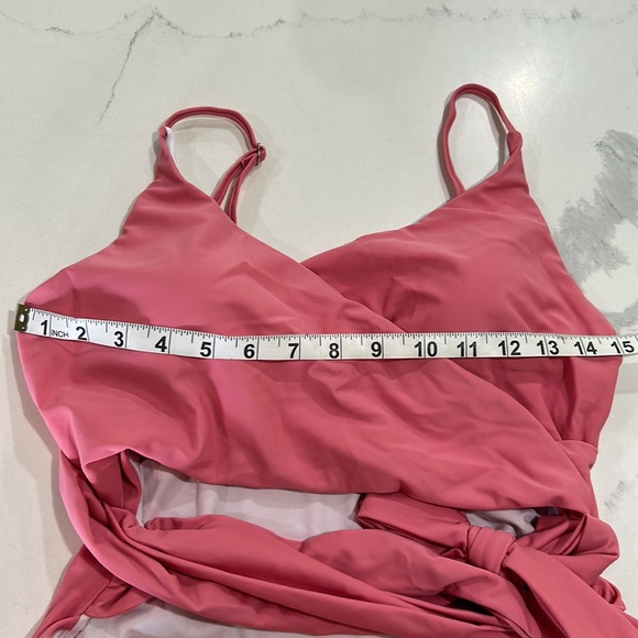 Adorable new never worn pink cut out one piece swimsuit. - Picture 8 of 9